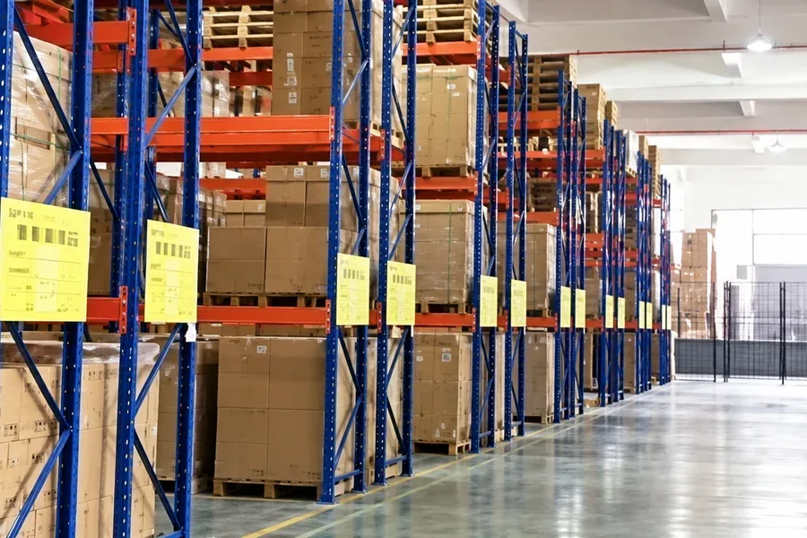 High-rack finished goods warehouse with carton storage